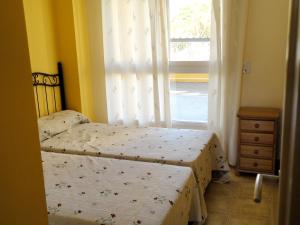 Posteľ alebo postele v izbe v ubytovaní Charming Apartment in Dénia with Shared Pool + 23 fotografií