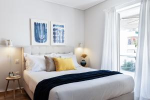 Posteľ alebo postele v izbe v ubytovaní Ideal 1 BR Apartment in Petralona by UPSTREET