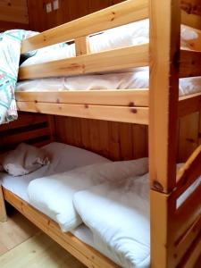 a couple of bunk beds in a room at Appartement de 3 chambres avec balcon et wifi a Vars a 2 km des pistes in Vars