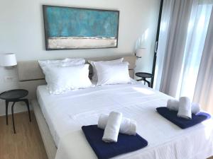 A bed or beds in a room at Villa ECO LUXE