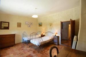 Postel nebo postele na pokoji v ubytování Charmante maison en Camargue avec piscine partagée + 17 fotografií