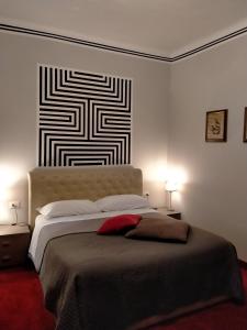 Letto o letti in una camera di Hotel Alpi Resort