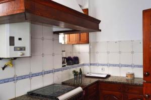 Køkken eller tekøkken på Charming house in Viana do Castelo with sea view + 15 billeder