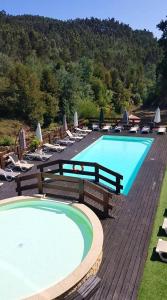 Bazén v ubytování 2 bedrooms chalet with shared pool furnished balcony and wifi at Albergaria a Velha nebo v jeho okolí