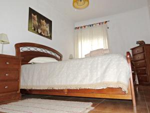 
A bed or beds in a room at House with 2 bedrooms in Miranda do Corvo with wonderful mountain view furnished terrace and WiFi
