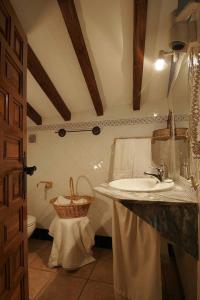 a bathroom with a sink and a toilet at Studio with balcony and wifi at Robledillo de Gata in Robledillo de Gata