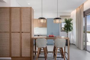 A kitchen or kitchenette at Anthos Villas - Chania