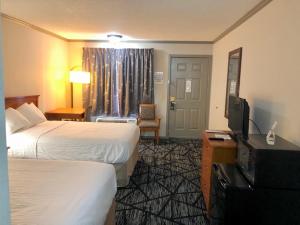 Postel nebo postele na pokoji v ubytování Days Inn by Wyndham Manning
