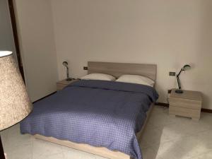 A bed or beds in a room at la nostra casa...