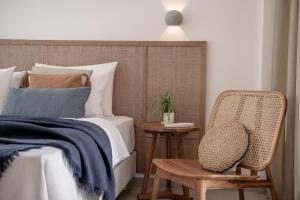 A bed or beds in a room at Anthos Villas - Chania