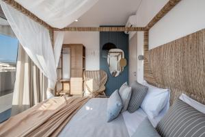 A bed or beds in a room at Anthos Villas - Chania Még 37 kép