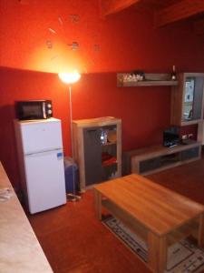 Kuchyň nebo kuchyňský kout v ubytování Apartmán v arealu Doky Lipno