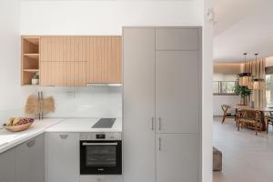 A kitchen or kitchenette at Anthos Villas - Chania