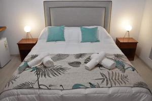 Voodi või voodid majutusasutuse Ambientes de la Patagonia toas