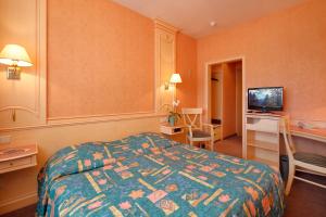 Letto o letti in una camera di Hotel Gruber