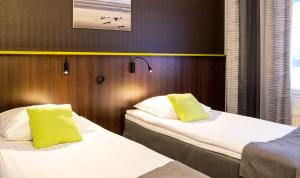 Postel nebo postele na pokoji v ubytování Finlandia Hotel Airport Oulu