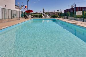 a swimming pool at a hotel with blue water at Country Inn & Suites by Radisson, Nashville, TN in Nashville