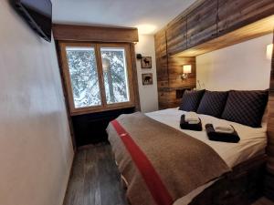 Postel nebo postele na pokoji v ubytování Verbier Medran + Private Sauna + 15 fotografií