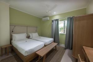 Voodi või voodid majutusasutuse Residence Praslinoise toas