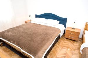Posteľ alebo postele v izbe v ubytovaní Cozy apartment in Kaštel Štafilić 27 m² with shared pool + 28 fotografií