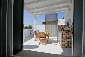 A balcony or terrace at B&B Villa Genny a pochi passi dal mare