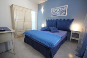 A bed or beds in a room at B&B Villa Genny a pochi passi dal mare