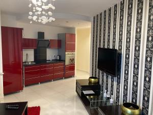 Ett kök eller pentry på JAB Apartments Bandurskiego Business & Family