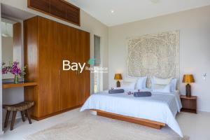 Ein Bett oder Betten in einem Zimmer der Unterkunft Bay Villas Koh Phangan