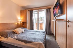 Posteľ alebo postele v izbe v ubytovaní Chalet Dorf Wagrain Alpenleben by AlpenTravel
