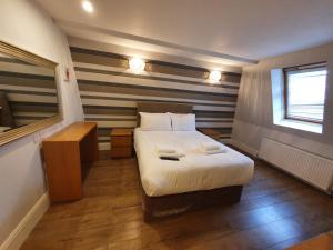 Postel nebo postele na pokoji v ubytování W6 Hotel