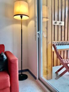 Appartement-Terrasse "Les Edelweiss" - Loudenvielle location的休息区