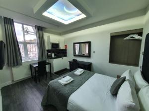 Postel nebo postele na pokoji v ubytování W6 Hotel