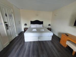 Postel nebo postele na pokoji v ubytování W6 Hotel