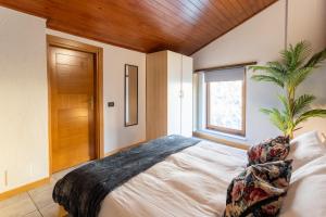 Katil atau katil-katil dalam bilik di Blue Attic - Historical Como City Center by Rent All Como