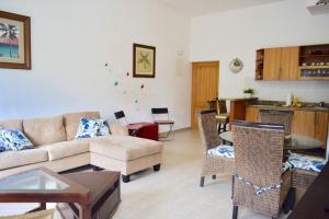A seating area at 3BR Apt @CadaquesCaribe Bayahibe