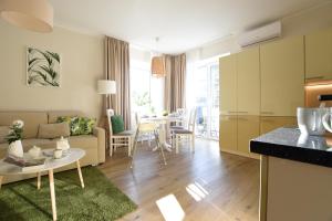 Kuchyňa alebo kuchynka v ubytovaní Apartamenty Pod Gwiazdami
