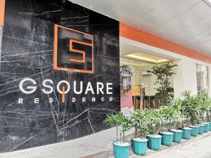 馬尼拉的住宿－G Square Residences，商店内植有植物的墙