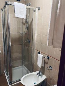 a bathroom with a shower and a sink at Tenuta Re Ferdinando in Santa Maria Capua Vetere