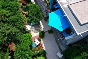 an overhead view of a house with a garden at Beachfront Apartment Mala Tereza in Split
