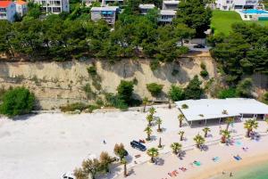 an aerial view of a beach with a building at Beachfront Apartment Mala Tereza in Split