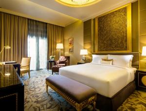 Kama o mga kama sa kuwarto sa Ezdan Palace Hotel