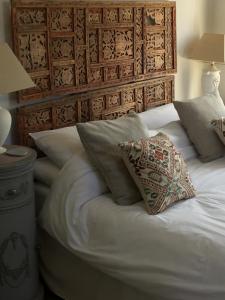 A bed or beds in a room at The Pinfold 