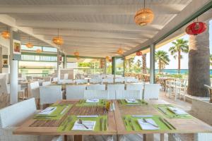 Een restaurant of ander eetgelegenheid bij Star Beach Village & Water Park