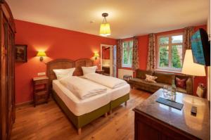 מיטה או מיטות בחדר ב-Hotel Anno 1848