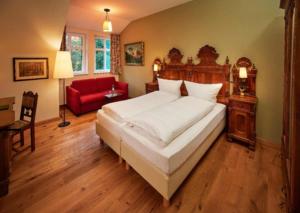 En eller flere senge i et værelse på Hotel Anno 1848