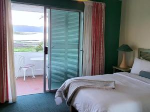 Postel nebo postele na pokoji v ubytování Lagoona Inn