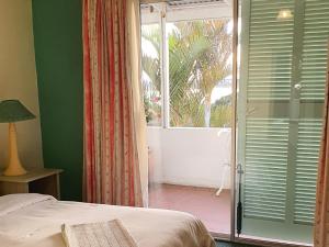 Postel nebo postele na pokoji v ubytování Lagoona Inn