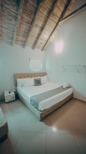 En eller flere senger på et rom på Casa Amanzi Hotel Cartagena