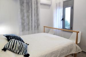 Postel nebo postele na pokoji v ubytování Calma apartment