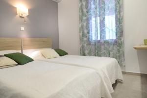 Postel nebo postele na pokoji v ubytování Calma apartment
